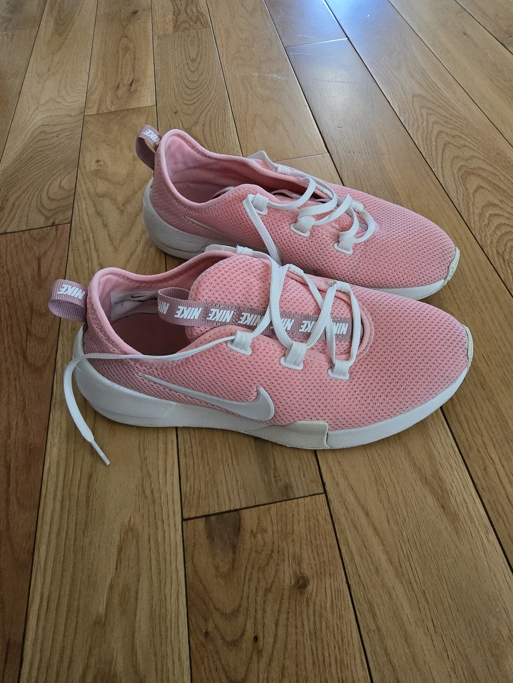 Nike Women's Pink Mesh Athletic Sneakers with White Swoosh